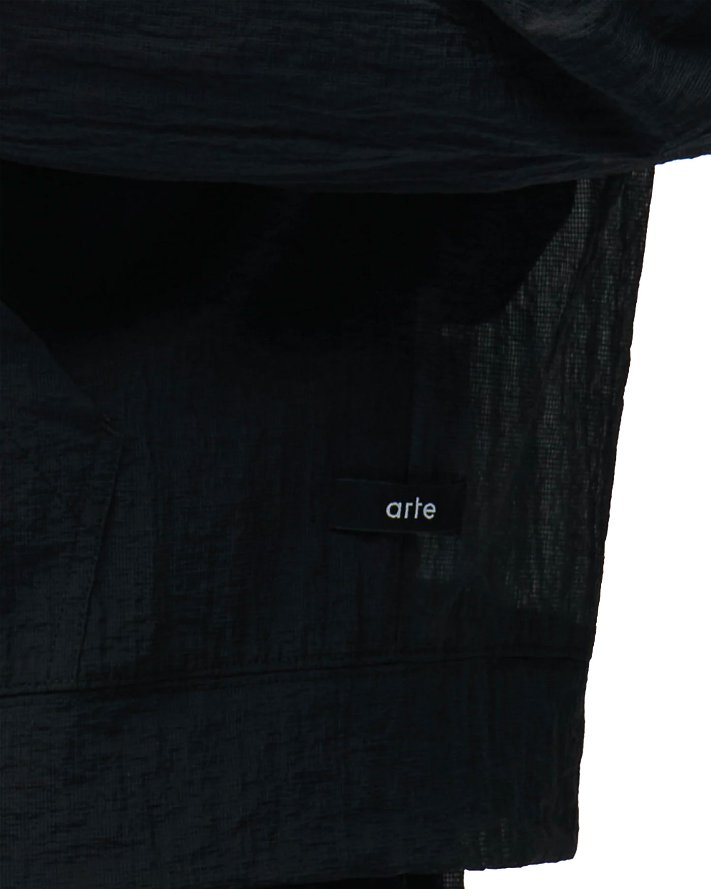 Veste coupe-vent Arte Antwerp noire détail poche et étiquette Arte