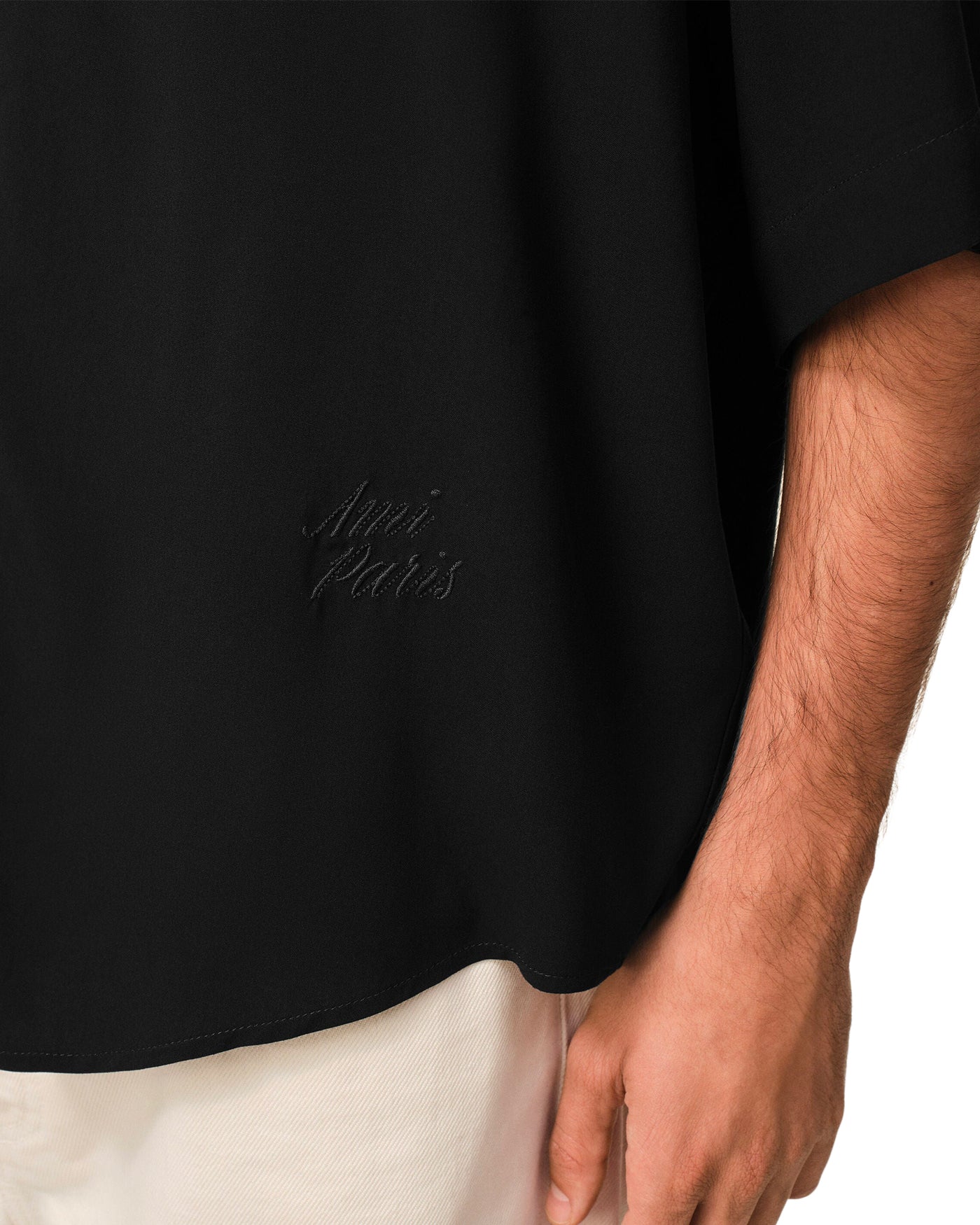 Chemise manches courtes boxy Ami Paris noire broderie logo vue profil droit