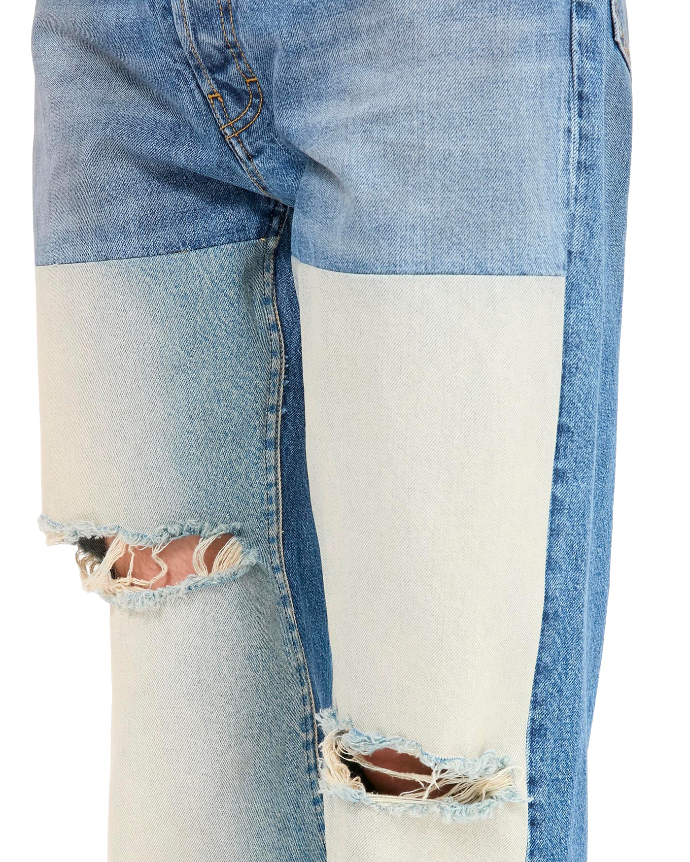 Jeans Maison Margiela bleu patchwork détail déchirures aux genoux face