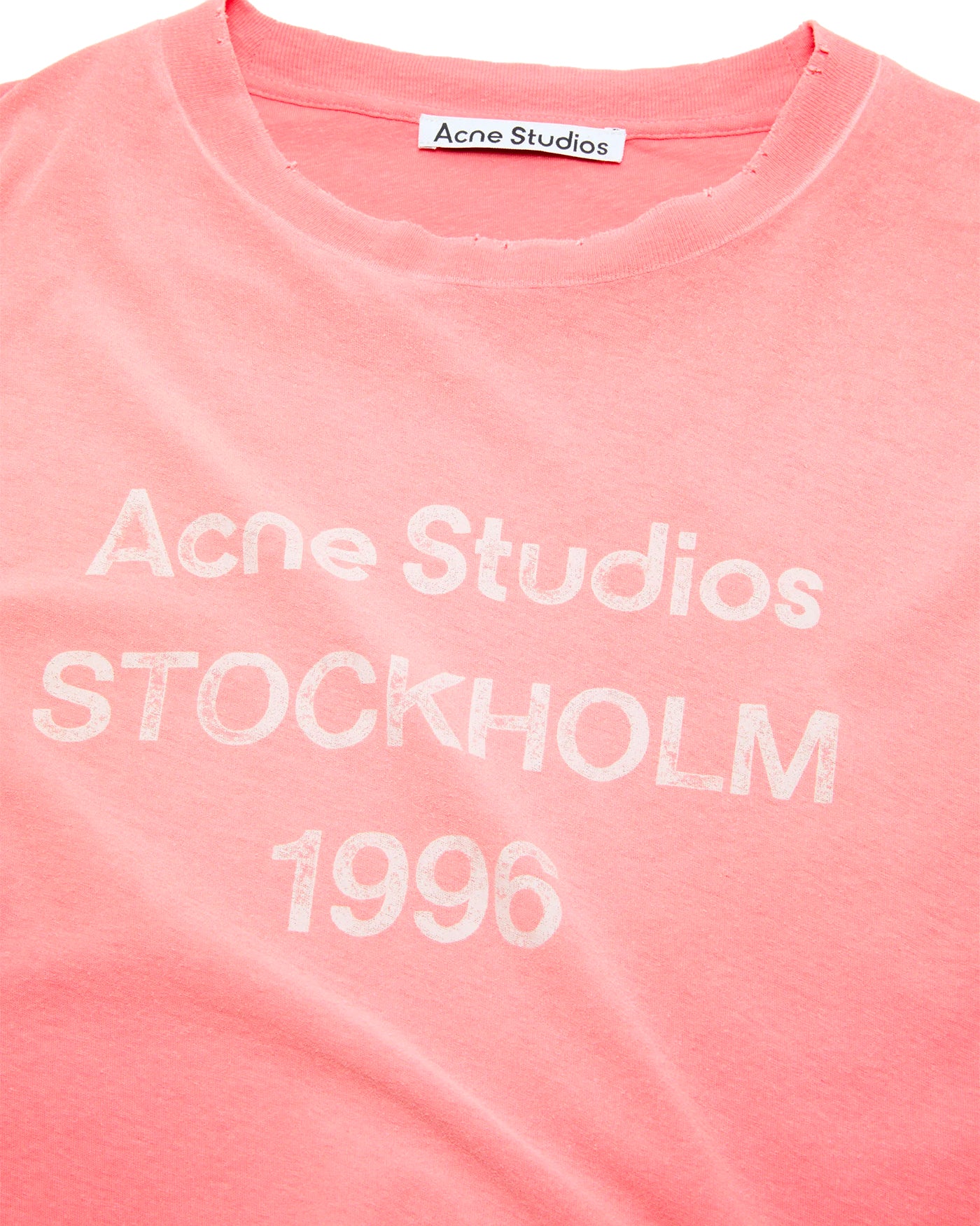T-shirt Acne Studios Stockholm 1996 rose corail délavé détail logo face