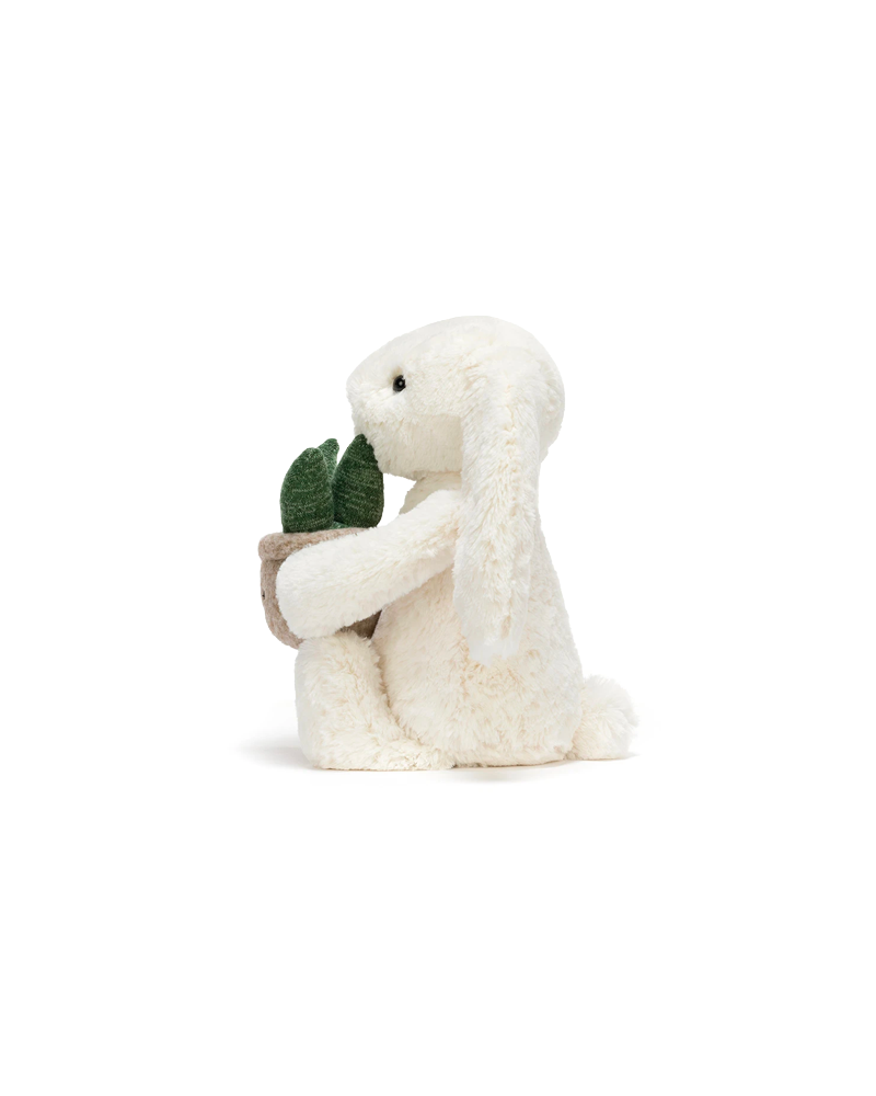 CREAM BUNNY WITH PLANT