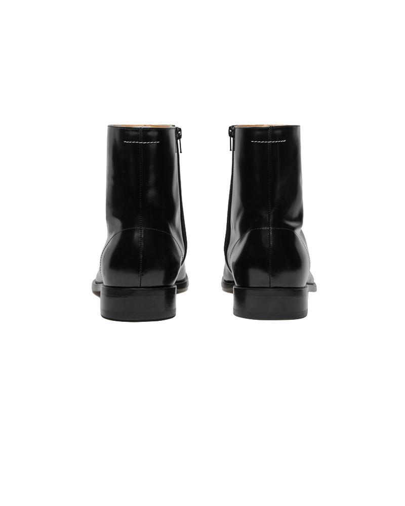 BOTTINES EN CUIR POLI NOIR