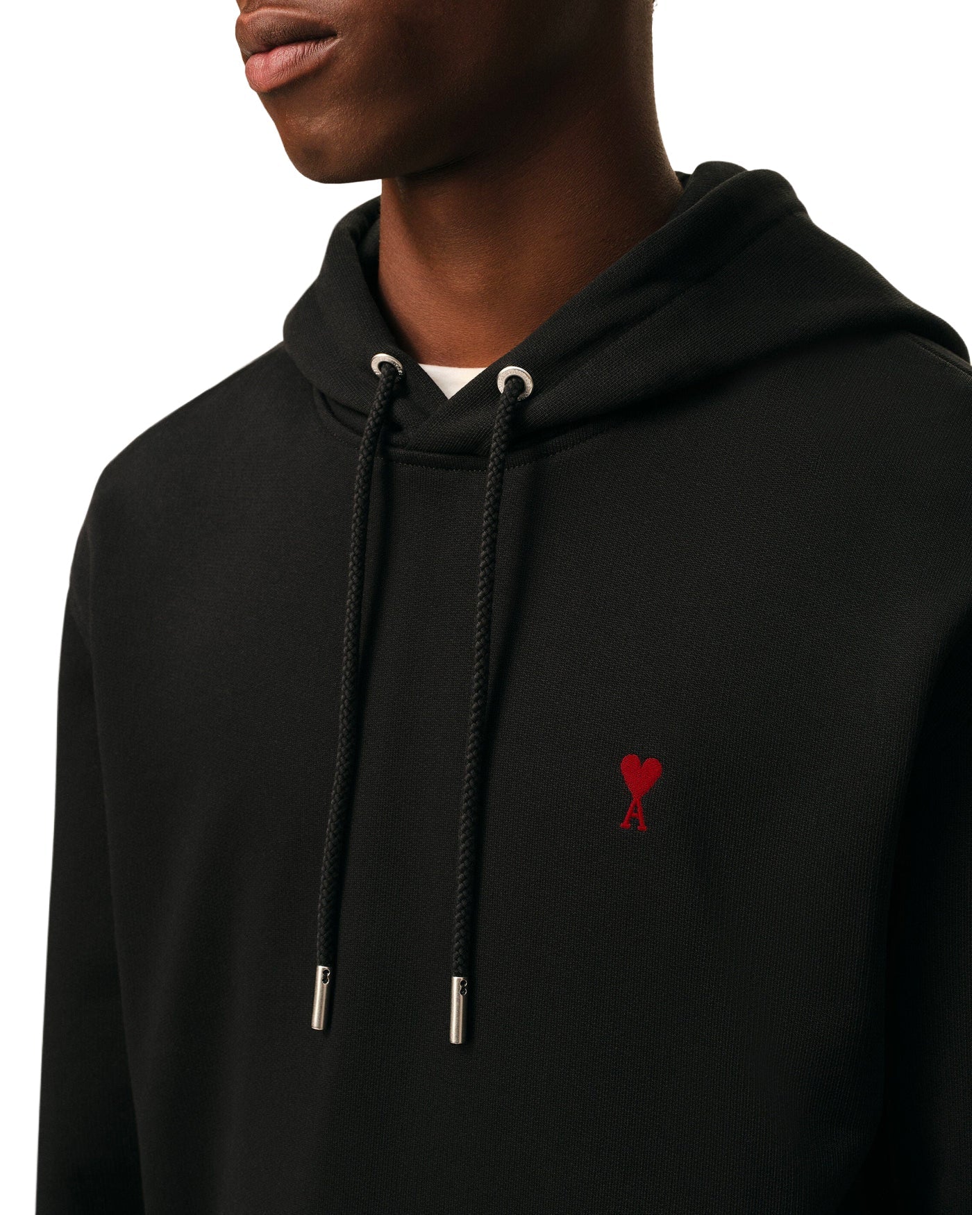Sweat à capuche Ami Paris noir détail logo cœur rouge brodé face