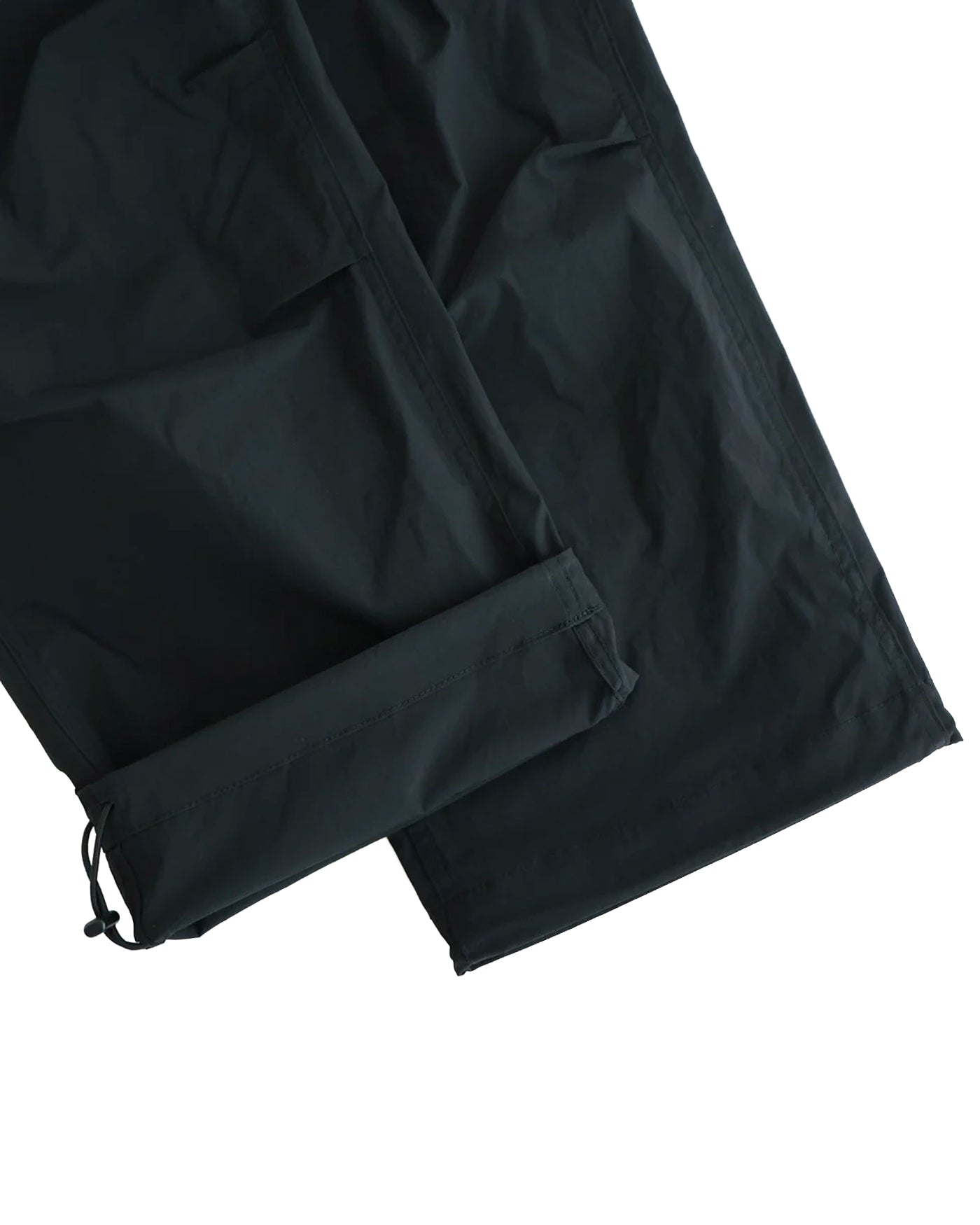 Pantalon Comme des Garçons Homme noir détail bas de jambe cordon coulisse
